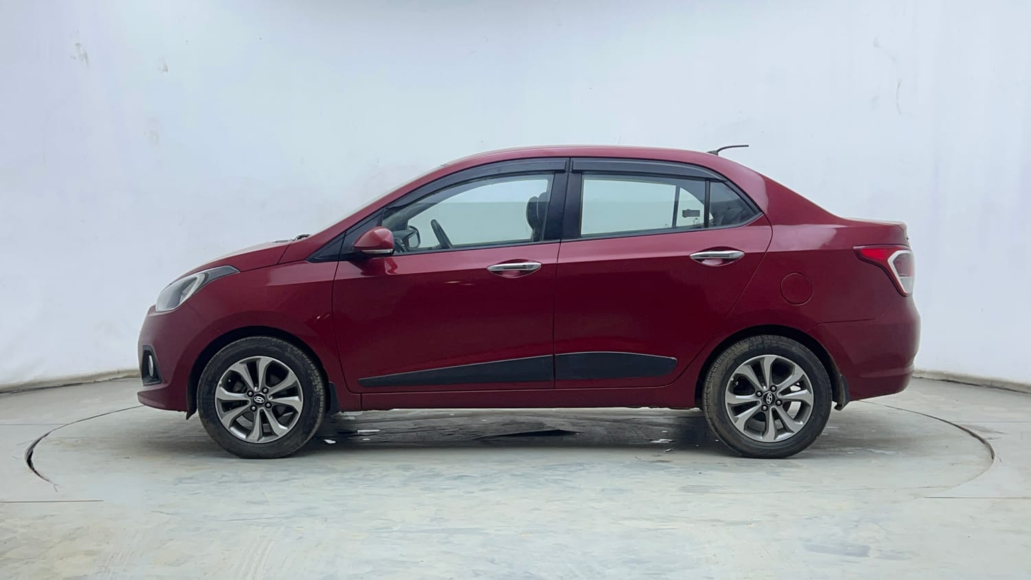 Used 2016 Hyundai Xcent SX 1.2 (O) Petrol Manual exterior LEFT SIDE VIEW
