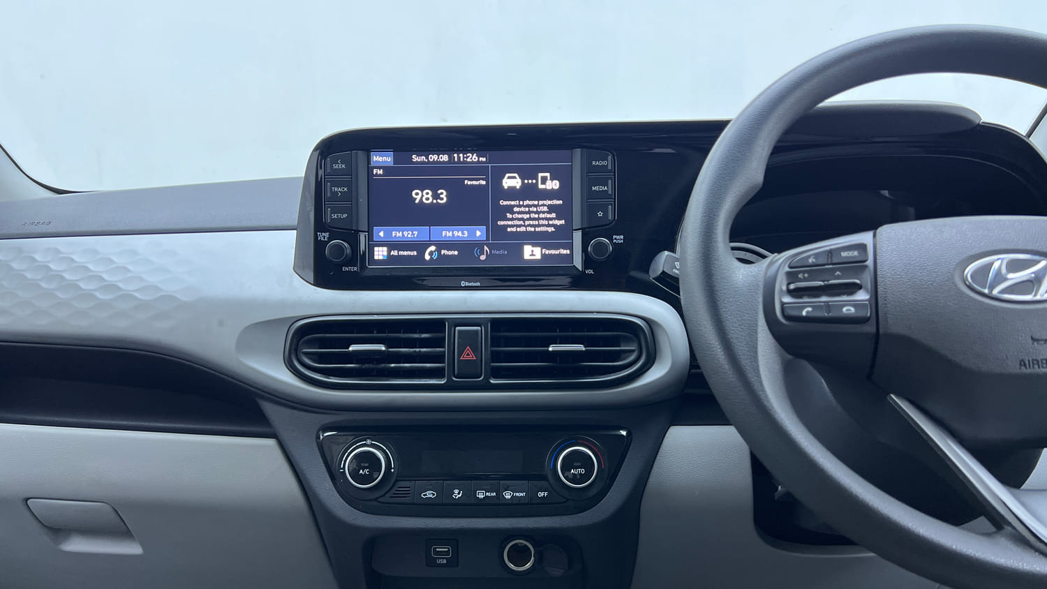 Used 2020 Hyundai Grand i10 Nios Sportz AMT 1.2 Kappa VTVT Petrol Automatic interior MUSIC SYSTEM & AC CONTROL VIEW