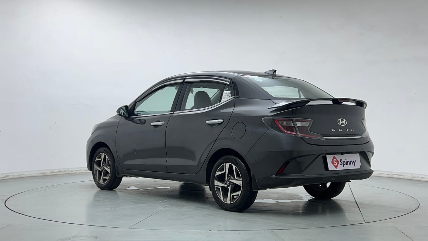 Used 2023 Hyundai Aura SX 1.2 CNG Cng Manual exterior LEFT REAR CORNER VIEW