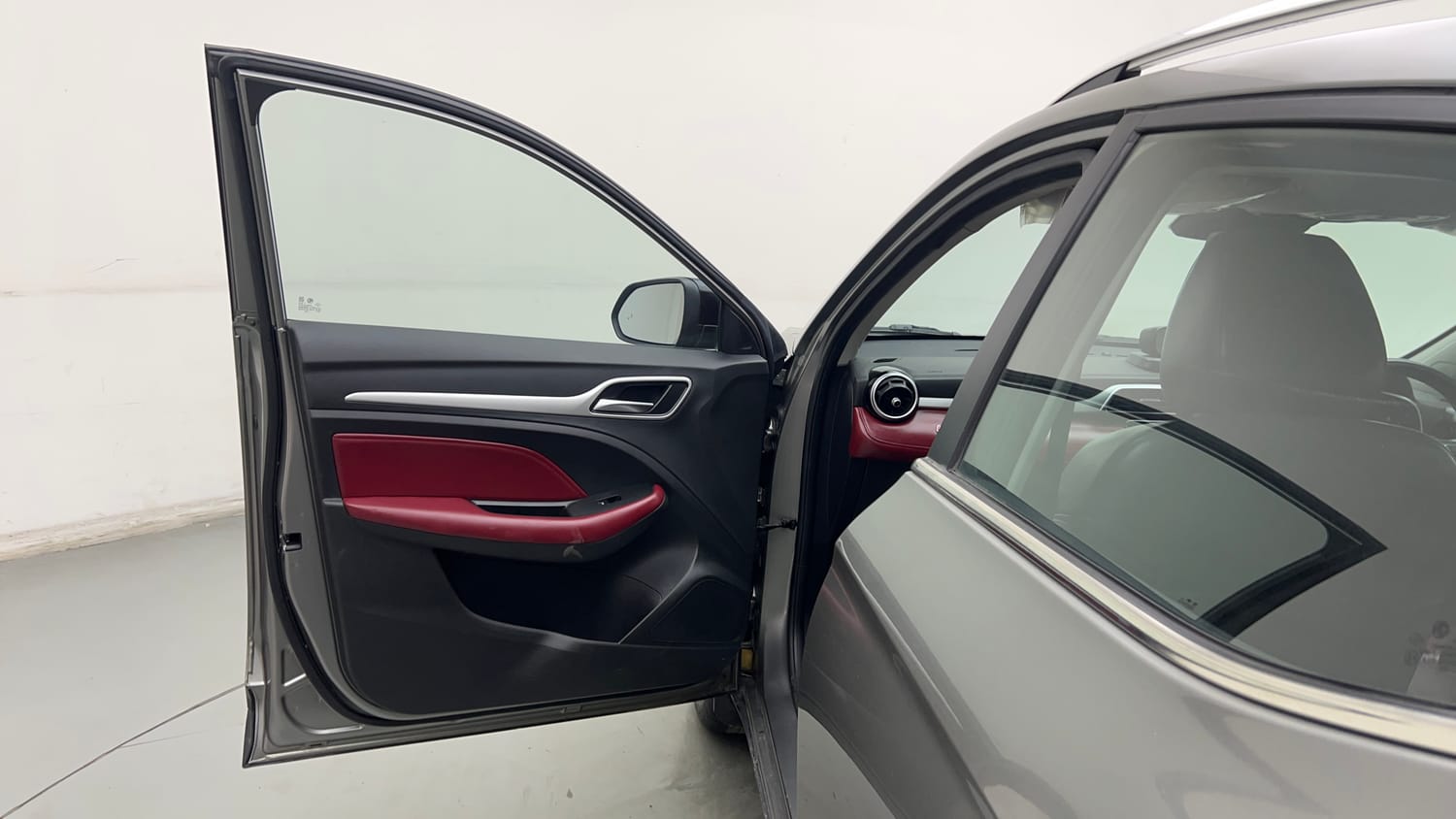 Used 2023 MG Motors Astor Savvy 1.3 Turbo AT S Red Petrol Automatic interior LEFT FRONT DOOR OPEN VIEW