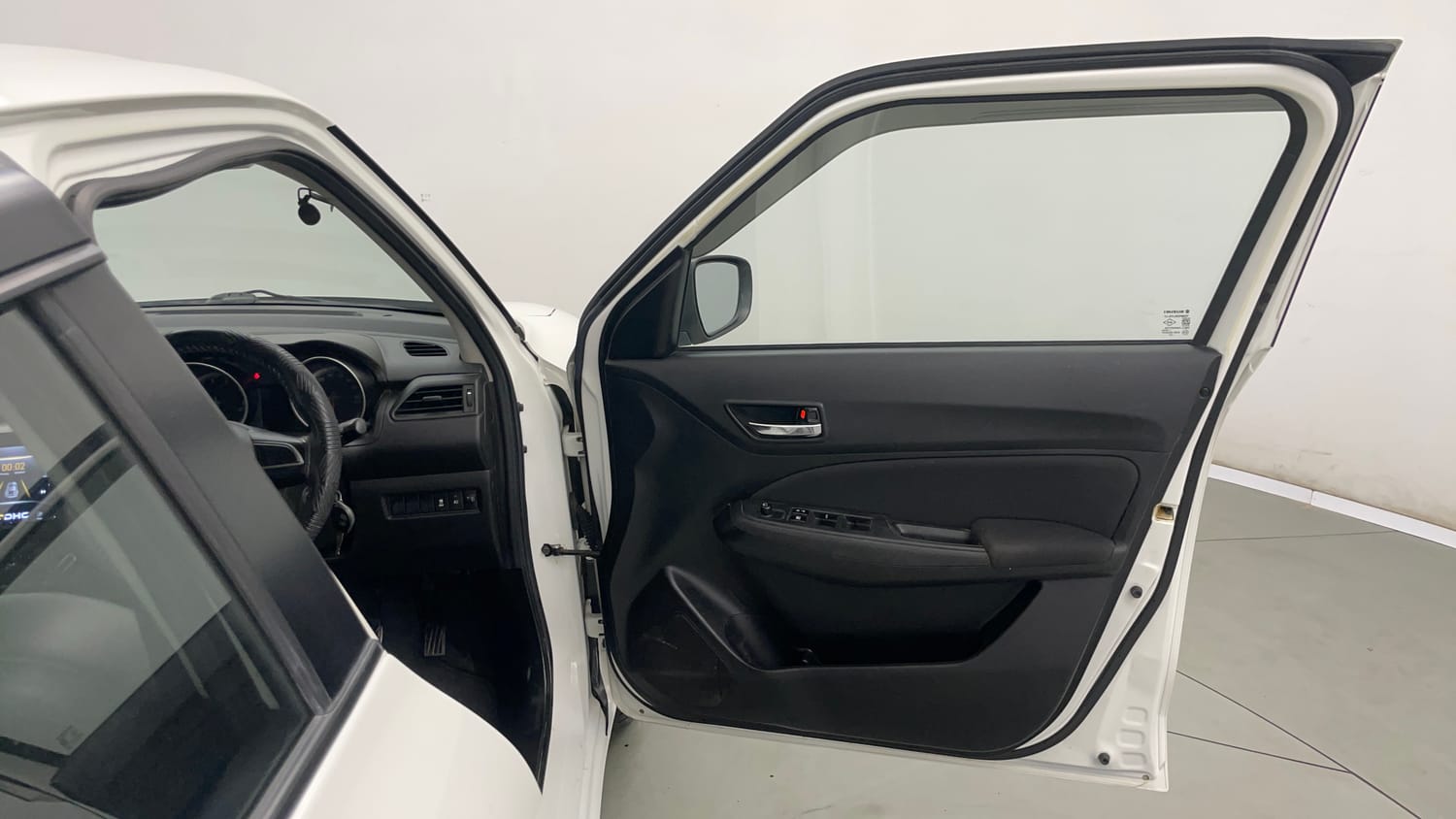 Used 2023 Maruti Suzuki Swift VXi Petrol Manual interior RIGHT FRONT DOOR OPEN VIEW