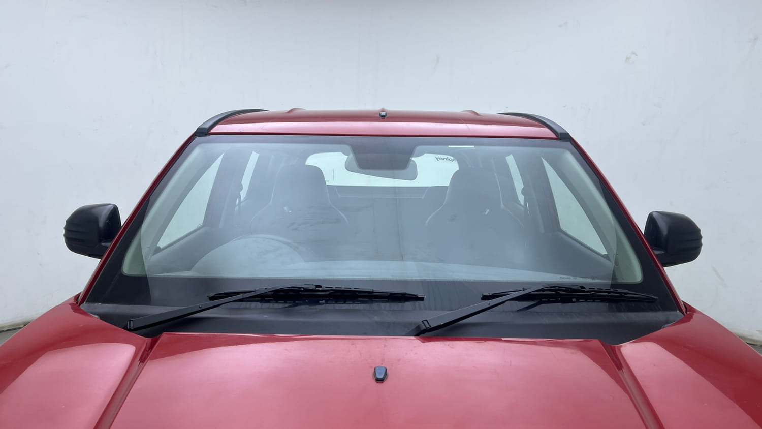 Used 2018 Mahindra KUV100 NXT K2 6 STR Petrol Manual exterior FRONT WINDSHIELD VIEW