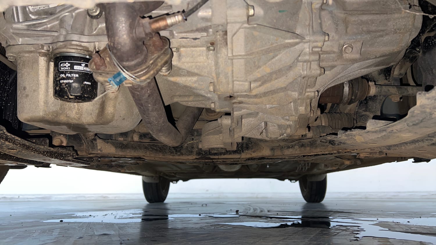 Used 2017 Maruti Suzuki Dzire VXi AMT Petrol Automatic extra FRONT LEFT UNDERBODY VIEW