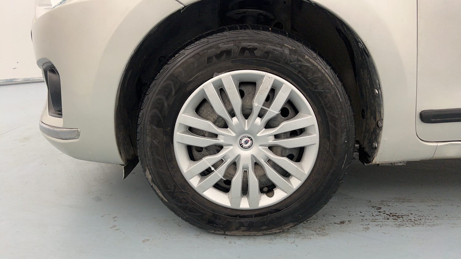 Used 2018 Maruti Suzuki Dzire VXi AMT Petrol Automatic tyres LEFT FRONT TYRE RIM VIEW