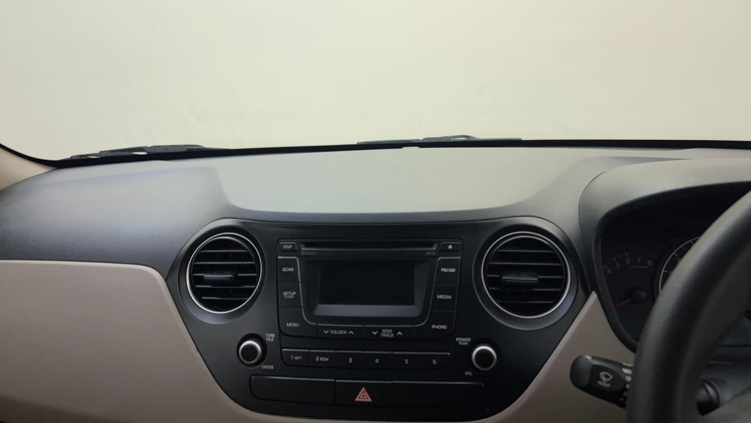 Used 2015 Hyundai Grand i10 Sportz 1.2 Kappa VTVT Petrol Manual top_features Integrated (in-dash) music system