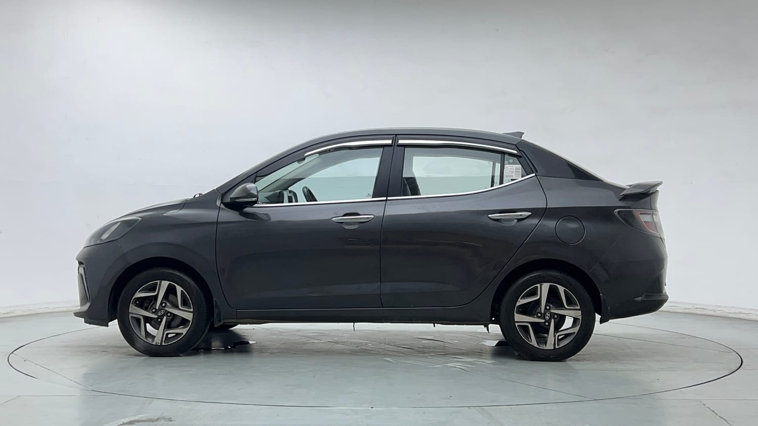 Used 2023 Hyundai Aura SX 1.2 CNG Cng Manual exterior LEFT SIDE VIEW