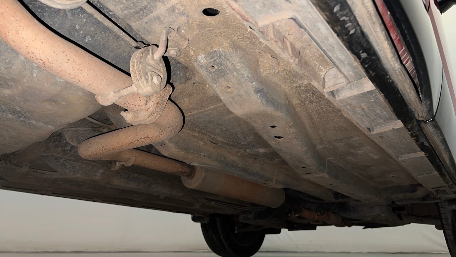 Used 2024 Tata Curvv Creative Plus S 1.2 Revotron Petrol 7DCA Petrol Automatic extra REAR RIGHT UNDERBODY VIEW