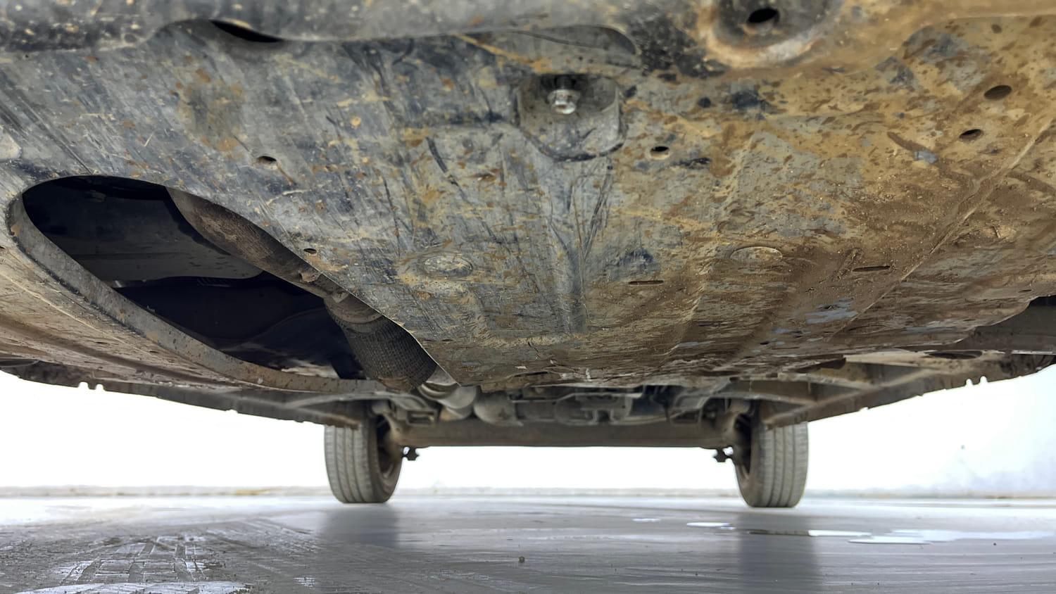 Used 2018 Mahindra KUV100 NXT K2 6 STR Petrol Manual extra FRONT LEFT UNDERBODY VIEW