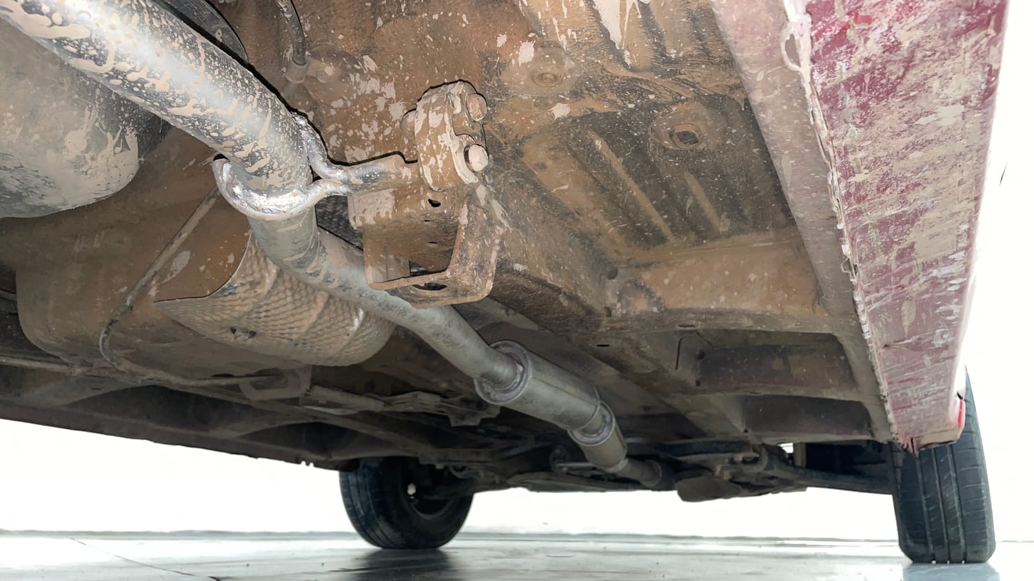 Used 2016 Mahindra KUV100 K2 Plus 6 STR Petrol Manual extra REAR RIGHT UNDERBODY VIEW