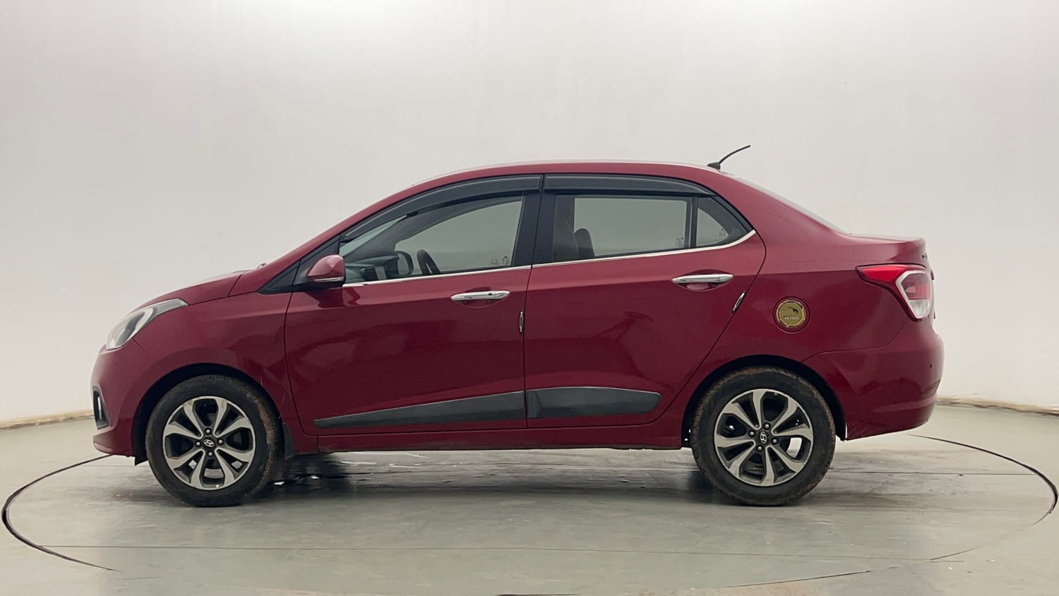 Used 2014 Hyundai Xcent SX 1.2 (O) Petrol Manual exterior LEFT SIDE VIEW