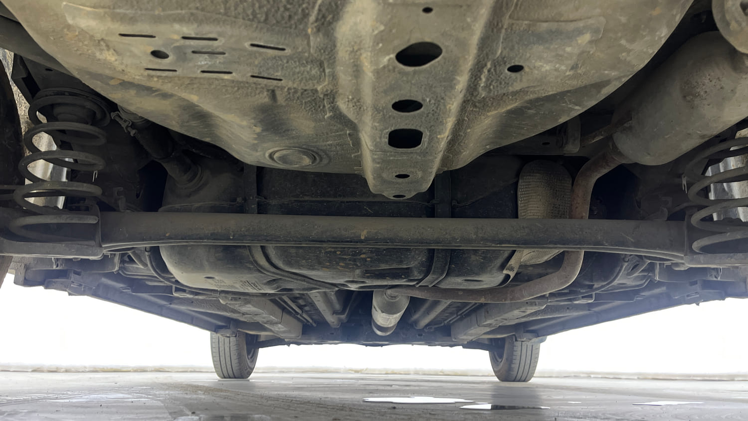 Used 2015 Maruti Suzuki Swift Dzire VXI Petrol Manual extra REAR UNDERBODY VIEW (TAKEN FROM REAR)