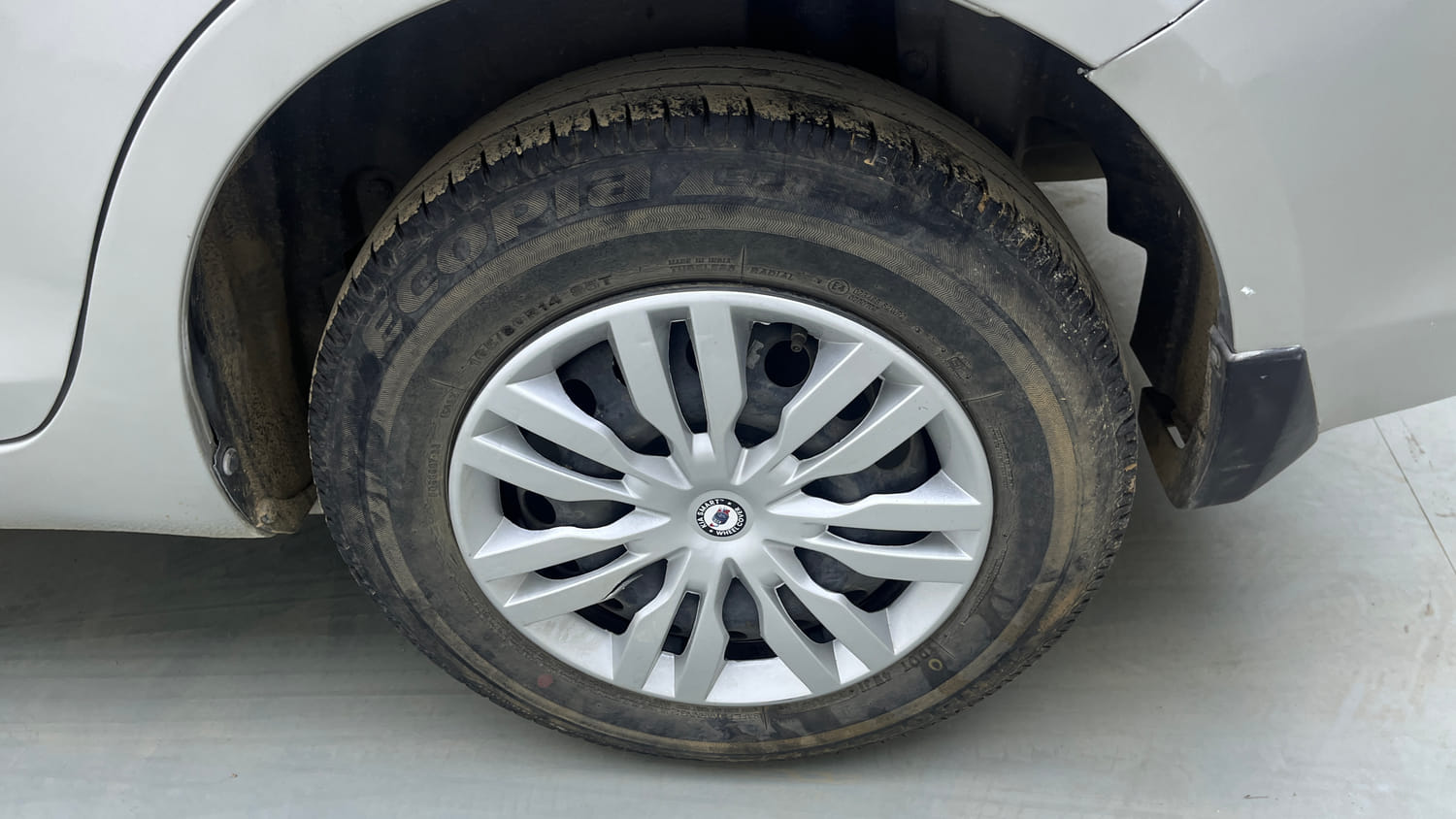 Used 2015 Maruti Suzuki Swift Dzire VXI Petrol Manual tyres LEFT REAR TYRE RIM VIEW
