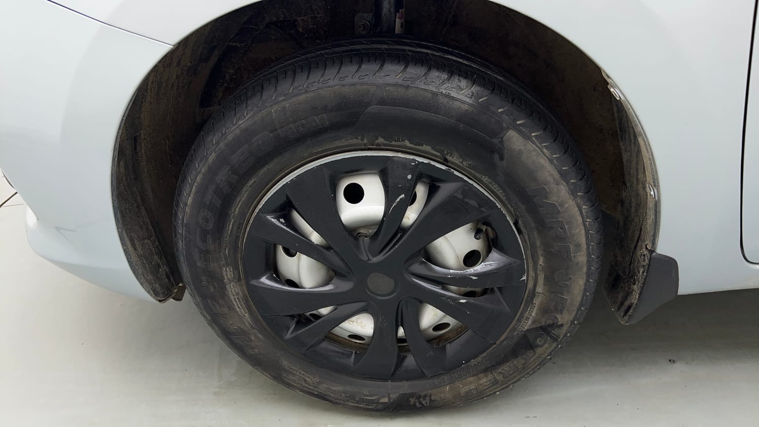 Used 2024 Maruti Suzuki Swift LXi Petrol Manual tyres LEFT FRONT TYRE RIM VIEW