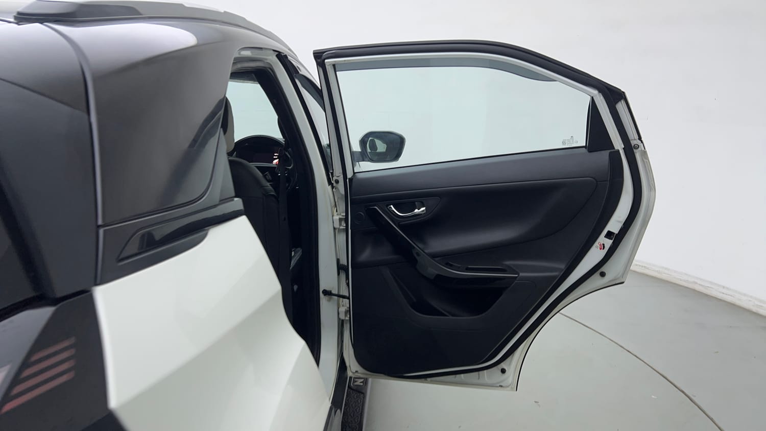 Used 2024 tata Nexon Fearless S 1.2 Revotron Petrol 7DCA Dual Tone Petrol Automatic interior RIGHT REAR DOOR OPEN VIEW