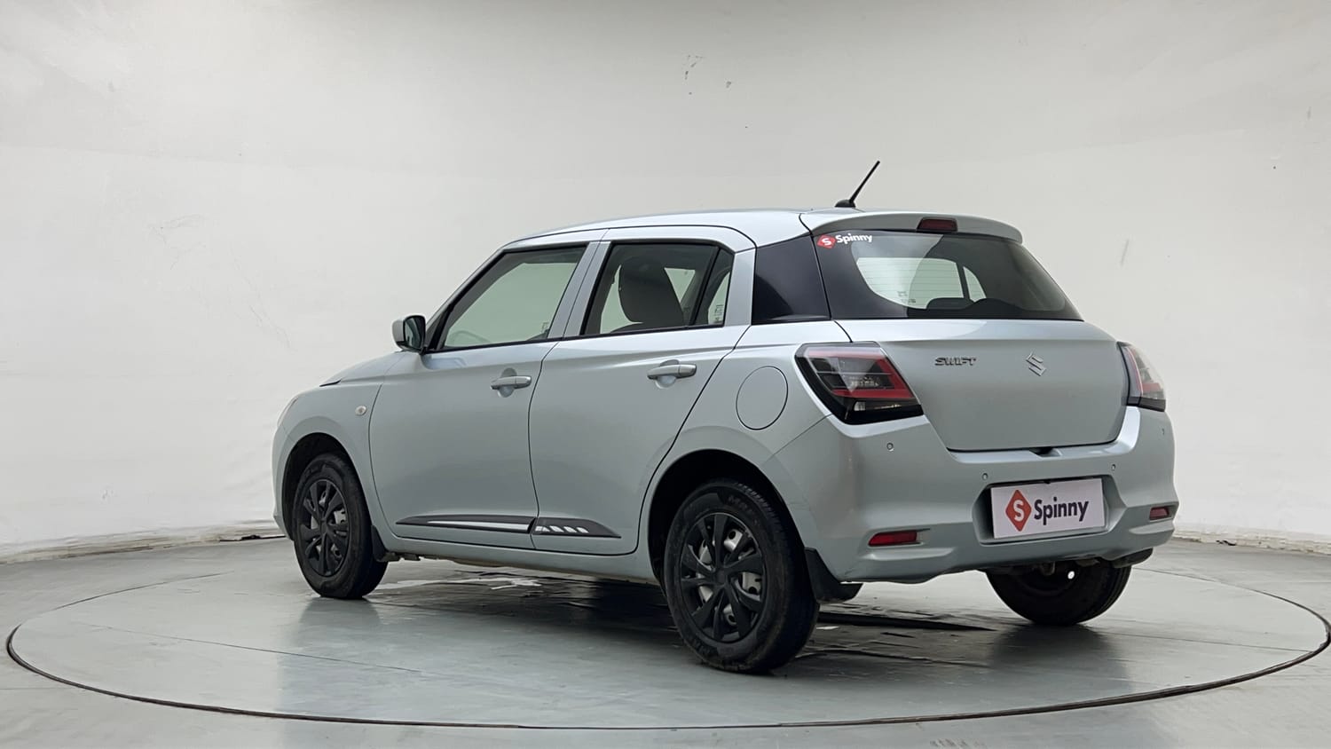 Used 2024 Maruti Suzuki Swift LXi Petrol Manual exterior LEFT REAR CORNER VIEW