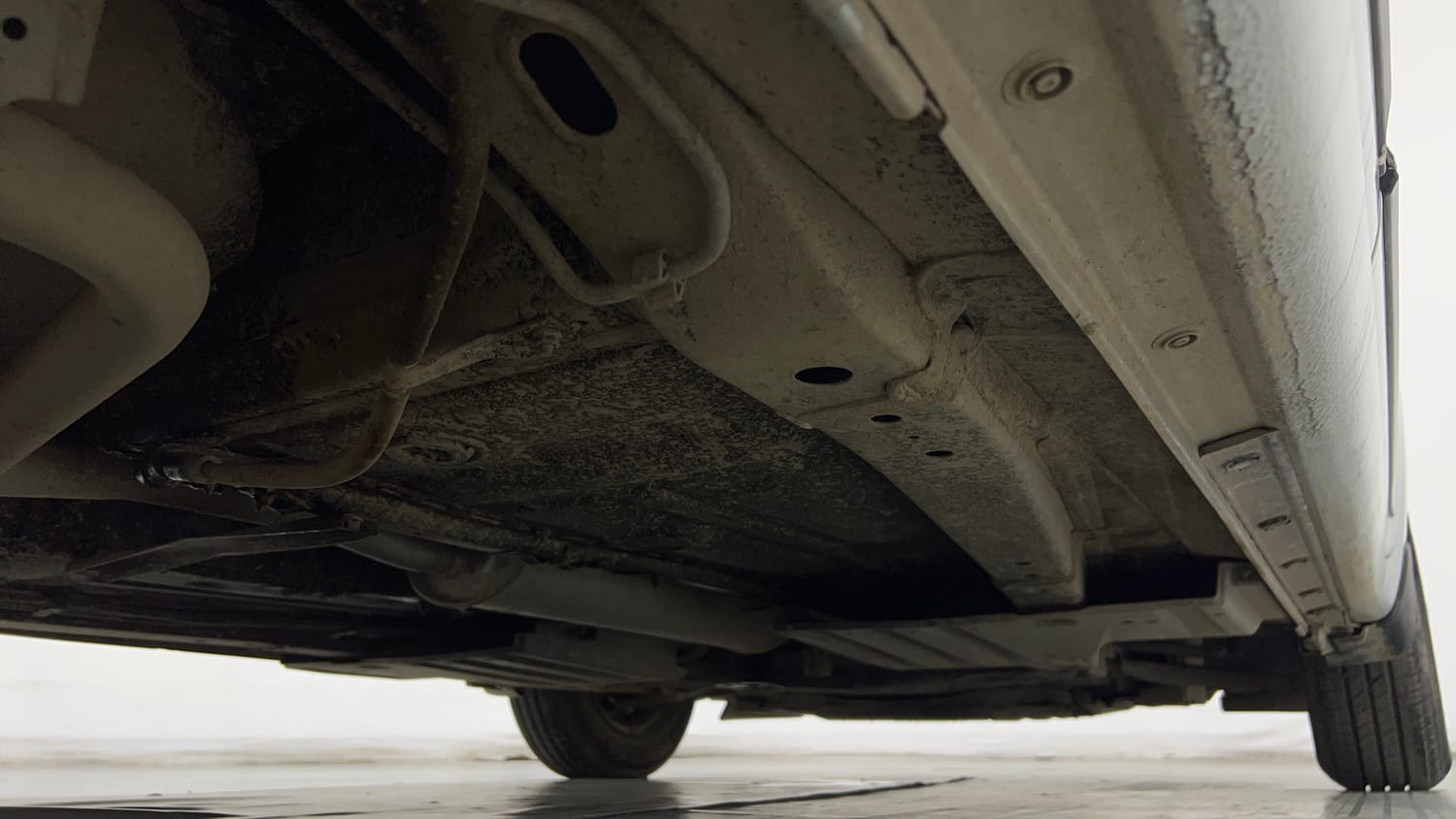 Used 2024 Maruti Suzuki Swift LXi Petrol Manual extra REAR RIGHT UNDERBODY VIEW
