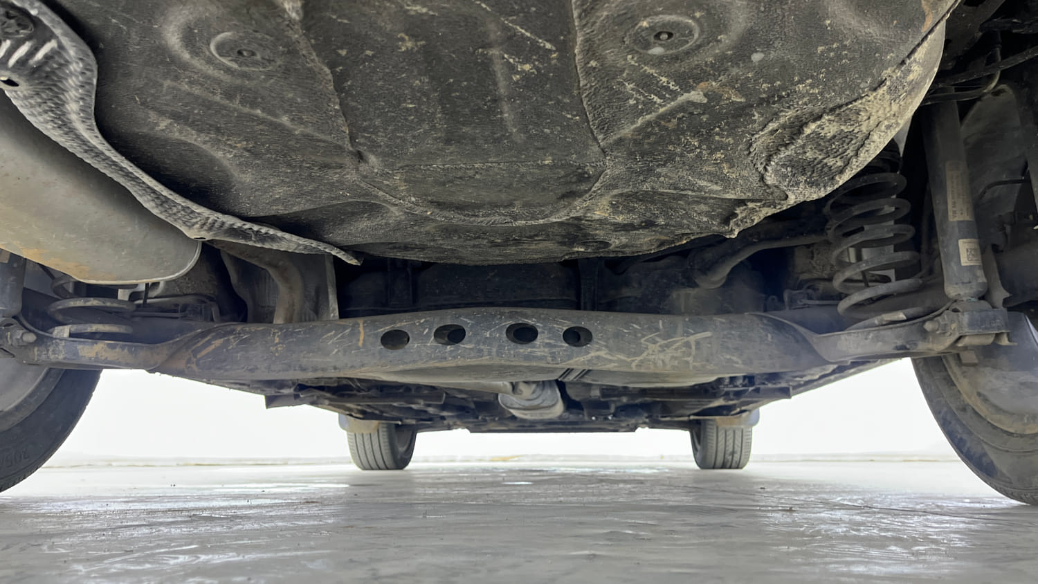 Used 2023 Volkswagen Virtus Topline 1.0 TSI AT Petrol Automatic extra REAR UNDERBODY VIEW (TAKEN FROM REAR)