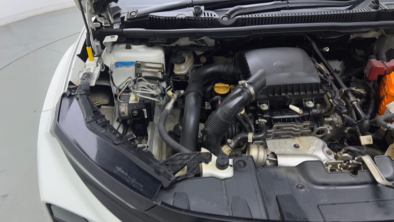 Used 2024 tata Nexon Fearless S 1.2 Revotron Petrol 7DCA Dual Tone Petrol Automatic engine ENGINE RIGHT SIDE VIEW