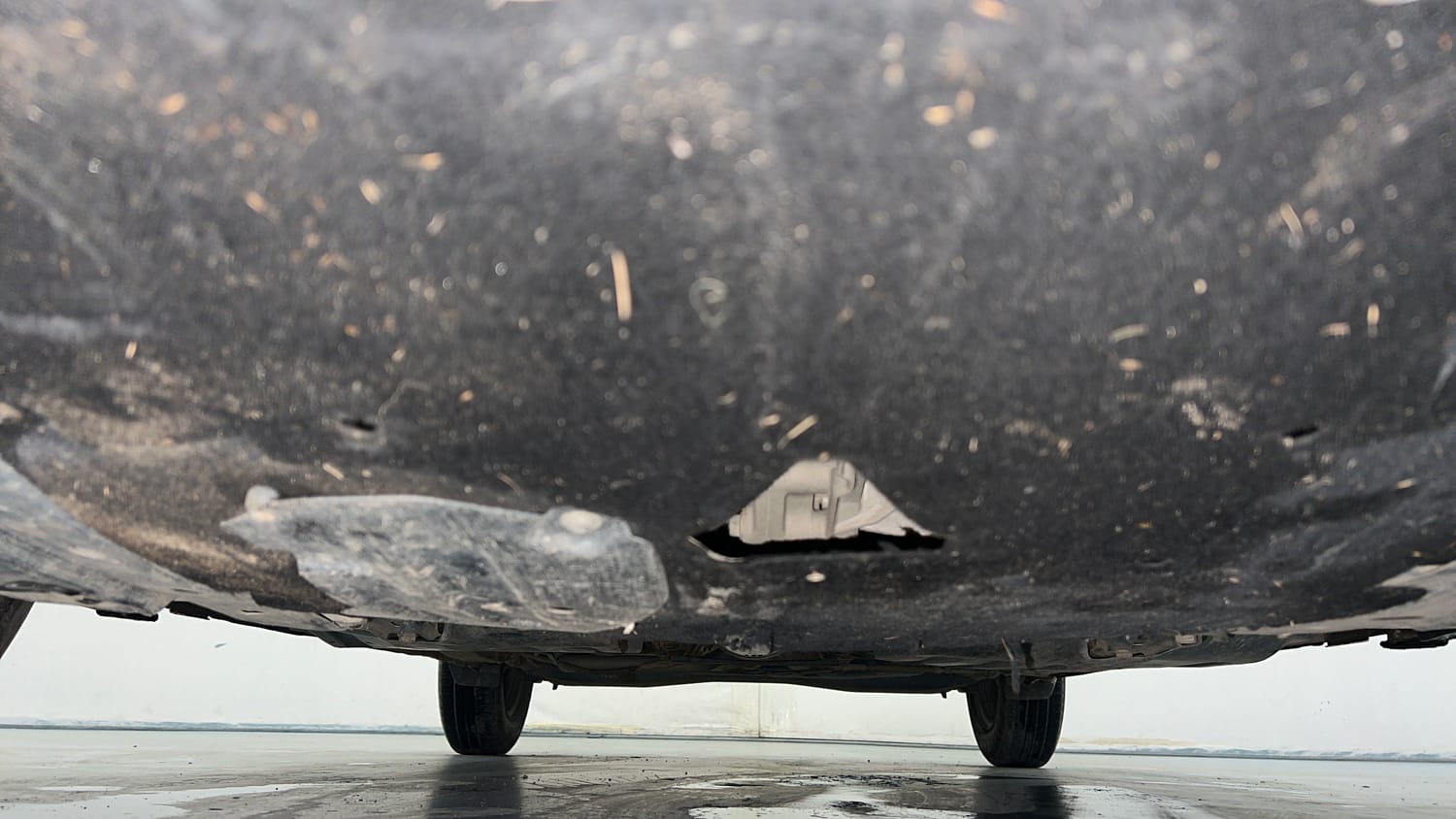 Used 2025 Maruti Suzuki Swift LXi Petrol Manual extra FRONT LEFT UNDERBODY VIEW