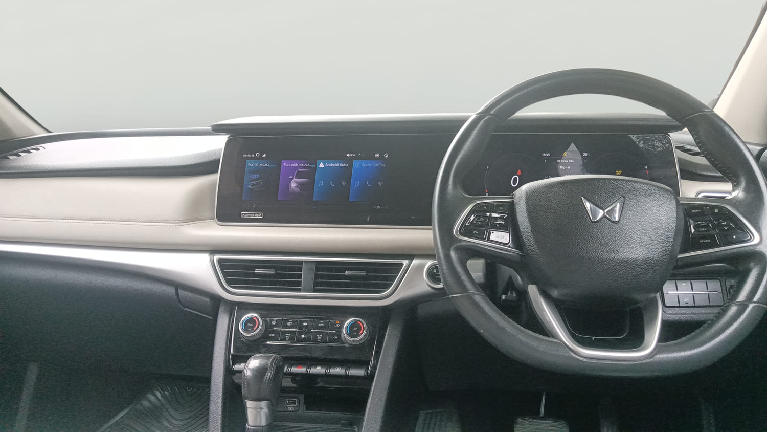 Used 2021 Mahindra XUV700 AX 7 Petrol AT Luxury Pack 7 STR Petrol Automatic interior MUSIC SYSTEM & AC CONTROL VIEW