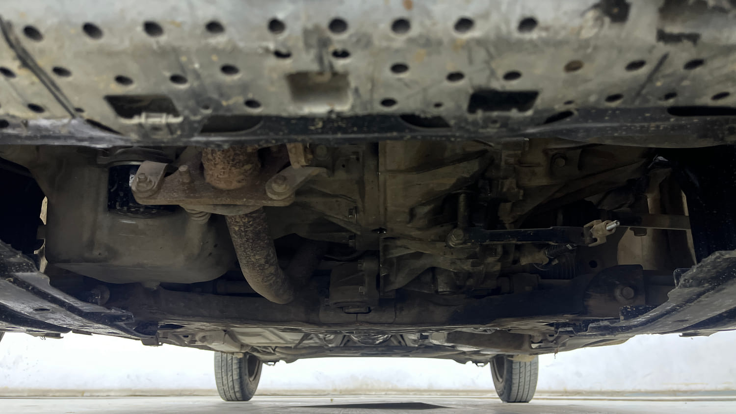 Used 2024 Maruti Suzuki Swift VXi Petrol Manual extra FRONT LEFT UNDERBODY VIEW