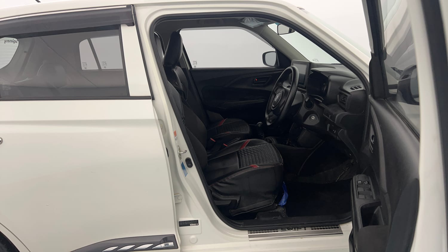 Used 2025 Maruti Suzuki Swift LXi Petrol Manual interior RIGHT SIDE FRONT DOOR CABIN VIEW