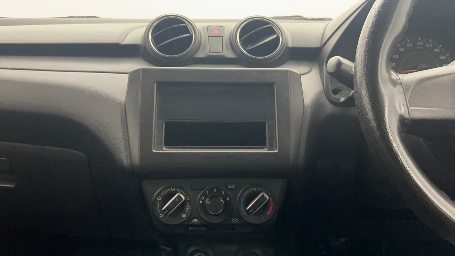Used 2018 Maruti Suzuki Swift LXi Petrol Manual interior MUSIC SYSTEM & AC CONTROL VIEW