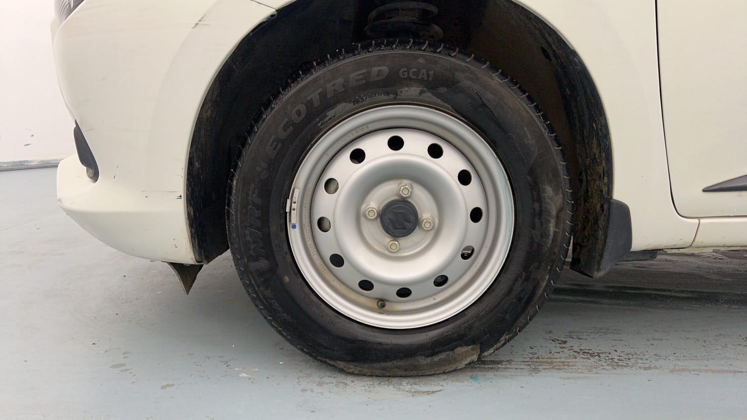 Used 2025 Maruti Suzuki Swift LXi Petrol Manual tyres LEFT FRONT TYRE RIM VIEW