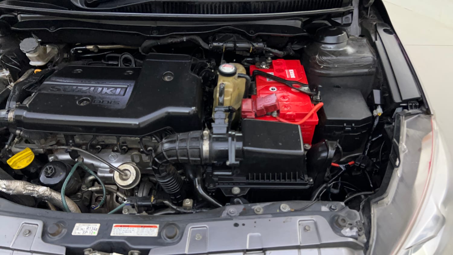 Used 2017 Maruti Suzuki Ciaz Zeta 1.3 Hybrid Diesel Manual engine ENGINE LEFT SIDE VIEW