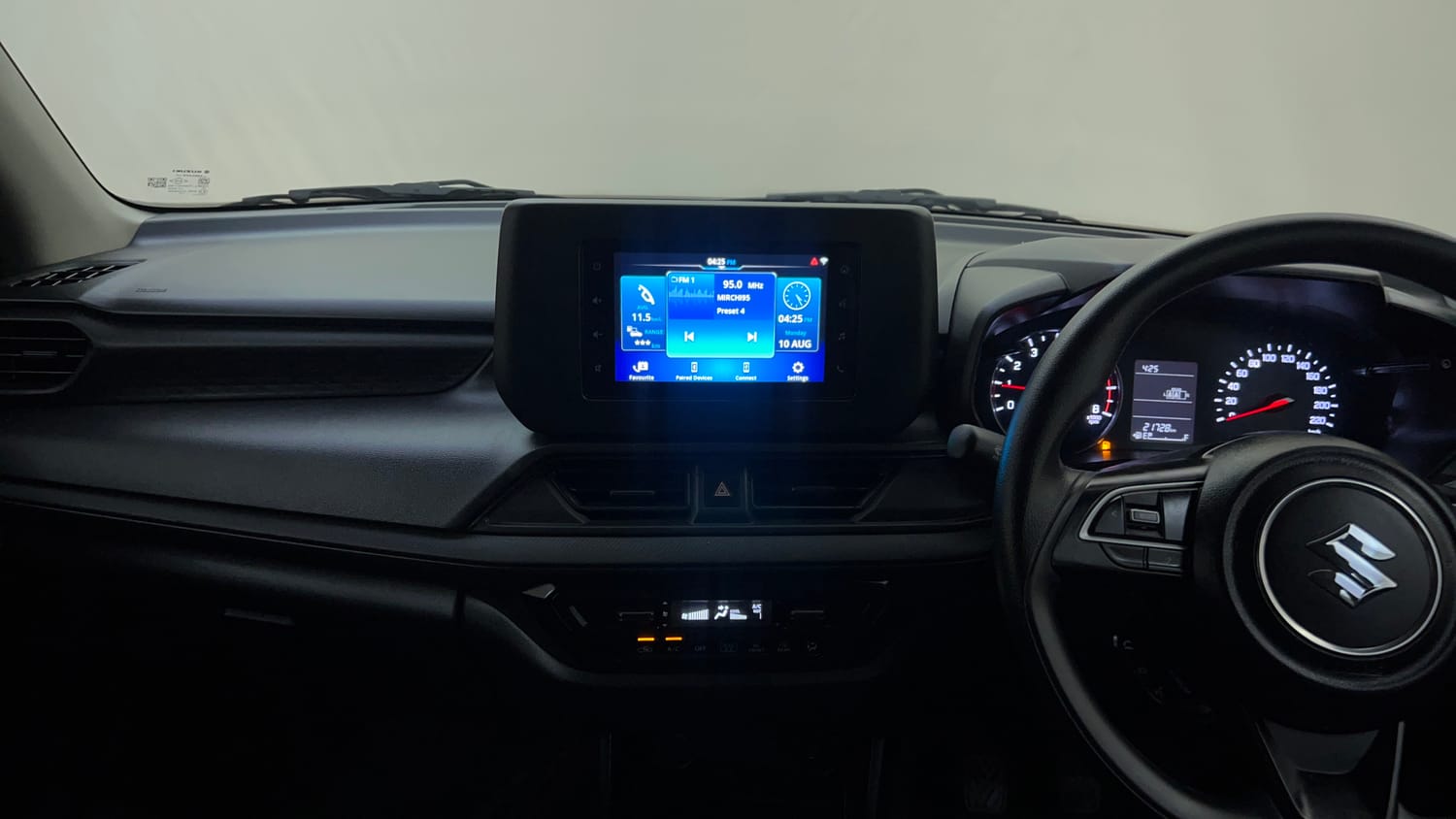 Used 2024 Maruti Suzuki Swift VXi Petrol Manual interior MUSIC SYSTEM & AC CONTROL VIEW