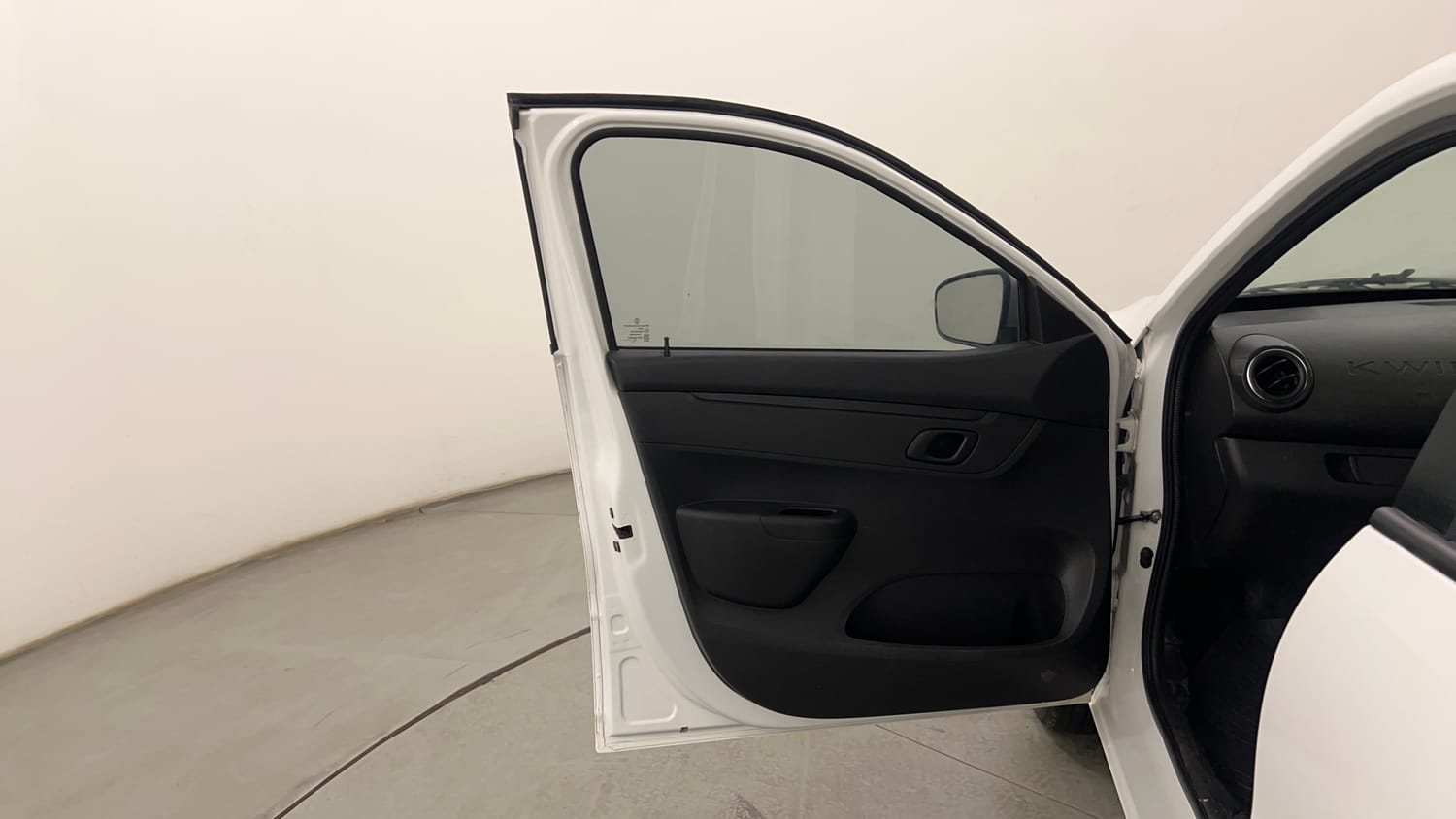 Used 2024 Renault Kwid RXT 1.0 Petrol Manual interior LEFT FRONT DOOR OPEN VIEW