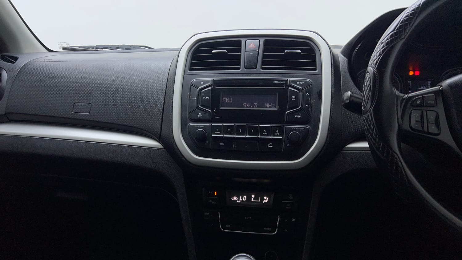 Used 2022 maruti-suzuki Vitara Brezza VXi Petrol Manual interior MUSIC SYSTEM & AC CONTROL VIEW
