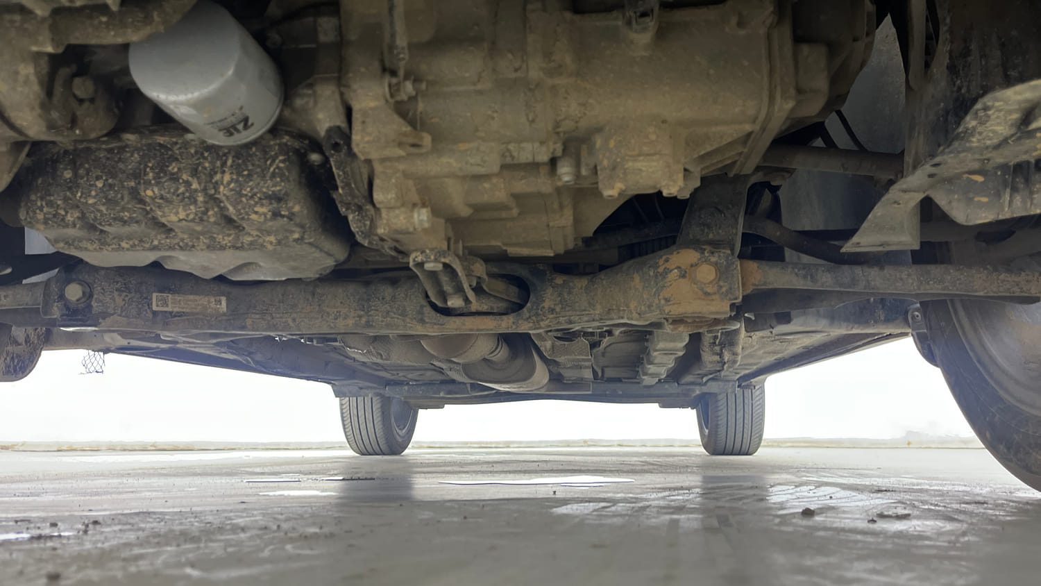 Used 2023 Volkswagen Taigun Topline 1.0 TSI MT Petrol Manual extra FRONT LEFT UNDERBODY VIEW