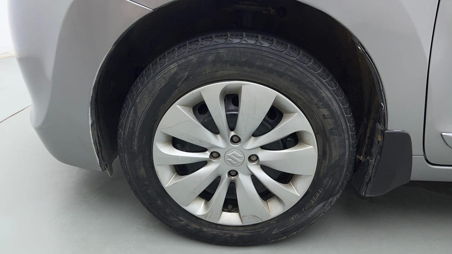 Used 2018 Maruti Suzuki Baleno Delta 1.2 Petrol Manual tyres LEFT FRONT TYRE RIM VIEW