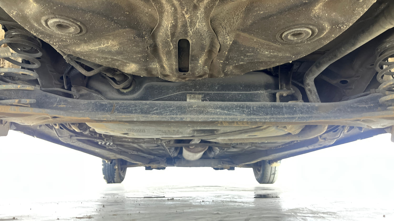 Used 2020 Maruti Suzuki Dzire VXi Petrol Manual extra REAR UNDERBODY VIEW (TAKEN FROM REAR)
