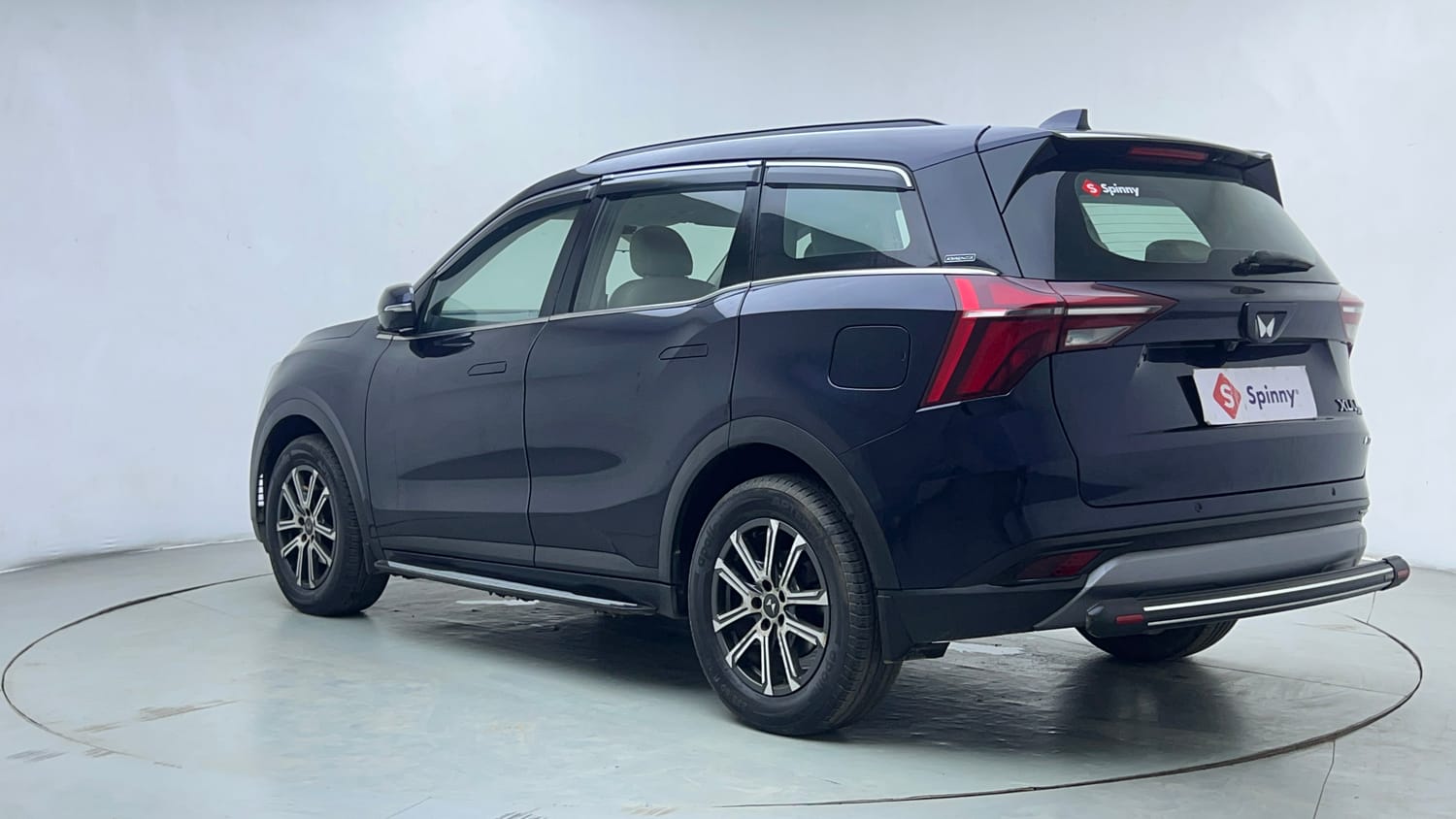 Used 2023 Mahindra XUV700 AX 7 Petrol MT 7 STR Petrol Manual exterior LEFT REAR CORNER VIEW