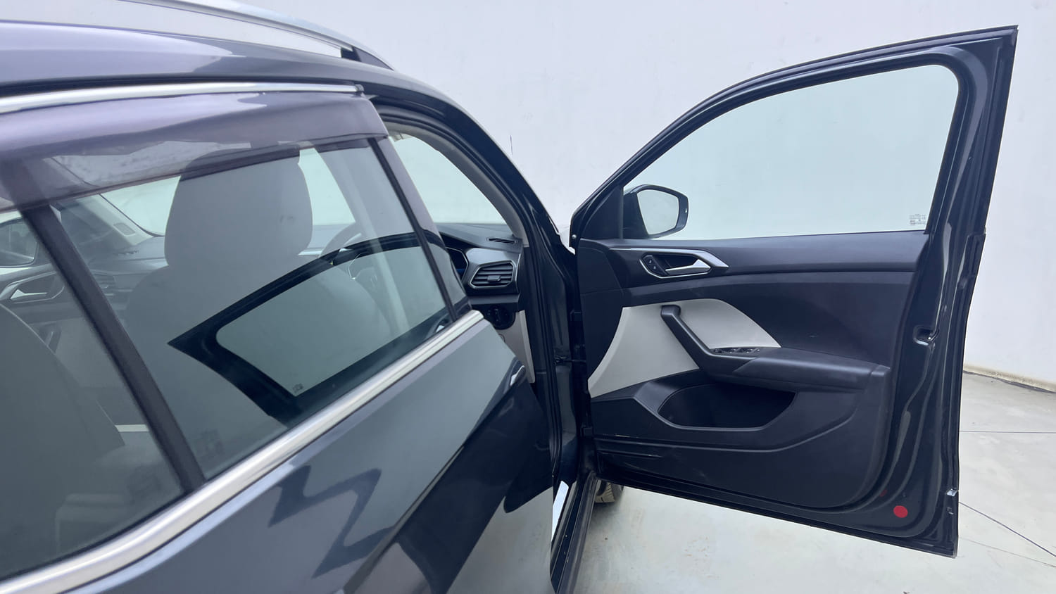 Used 2023 Volkswagen Taigun Topline 1.0 TSI MT Petrol Manual interior RIGHT FRONT DOOR OPEN VIEW