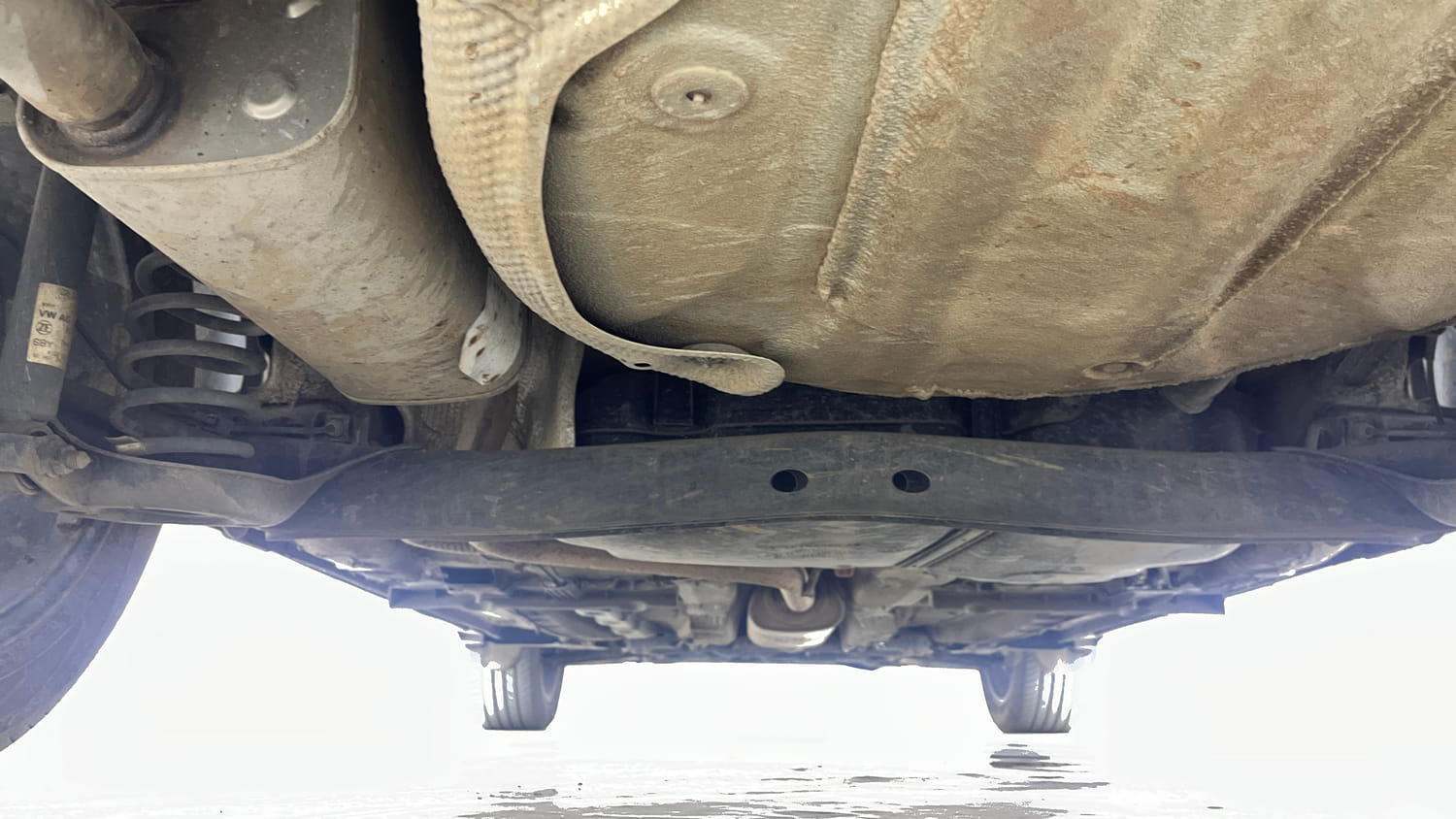 Used 2023 Volkswagen Taigun Topline 1.0 TSI MT Petrol Manual extra REAR UNDERBODY VIEW (TAKEN FROM REAR)