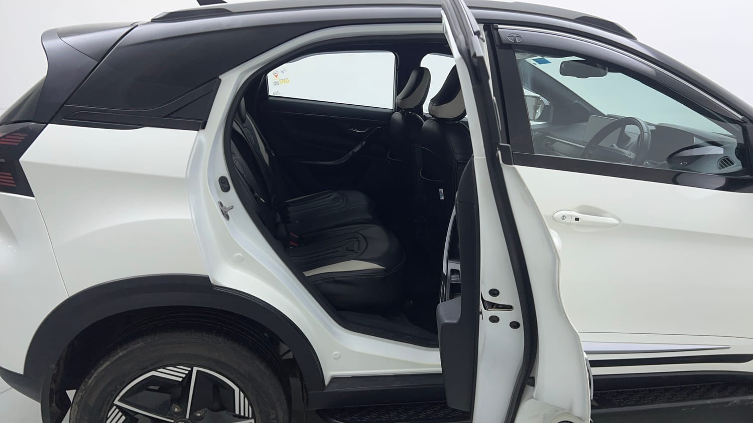 Used 2024 tata Nexon Fearless S 1.2 Revotron Petrol 7DCA Dual Tone Petrol Automatic interior RIGHT SIDE REAR DOOR CABIN VIEW