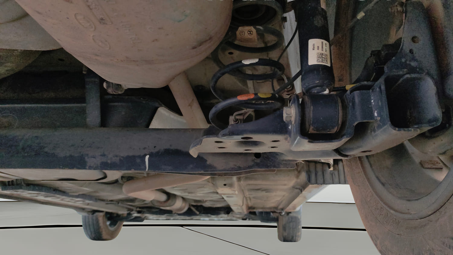 Used 2021 Hyundai Grand i10 Nios Sportz AMT 1.2 Kappa VTVT Petrol Automatic extra REAR RIGHT UNDERBODY VIEW
