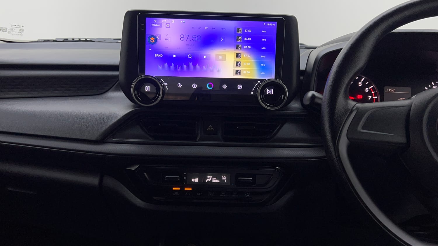 Used 2024 Maruti Suzuki Swift LXi Petrol Manual interior MUSIC SYSTEM & AC CONTROL VIEW
