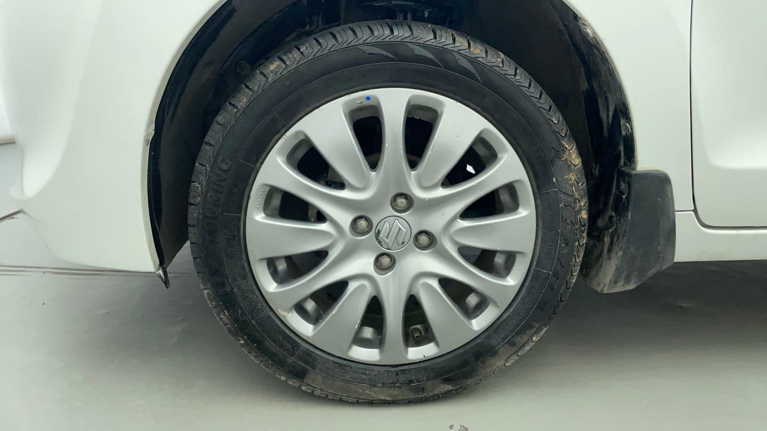 Used 2018 Maruti Suzuki Baleno Zeta 1.2 Petrol Manual tyres LEFT FRONT TYRE RIM VIEW