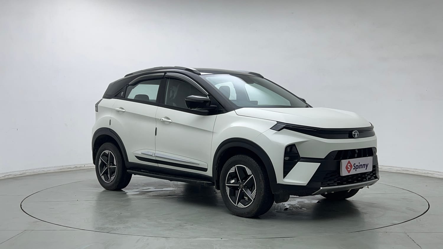 Used 2024 tata Nexon Fearless S 1.2 Revotron Petrol 7DCA Dual Tone Petrol Automatic exterior RIGHT FRONT CORNER VIEW