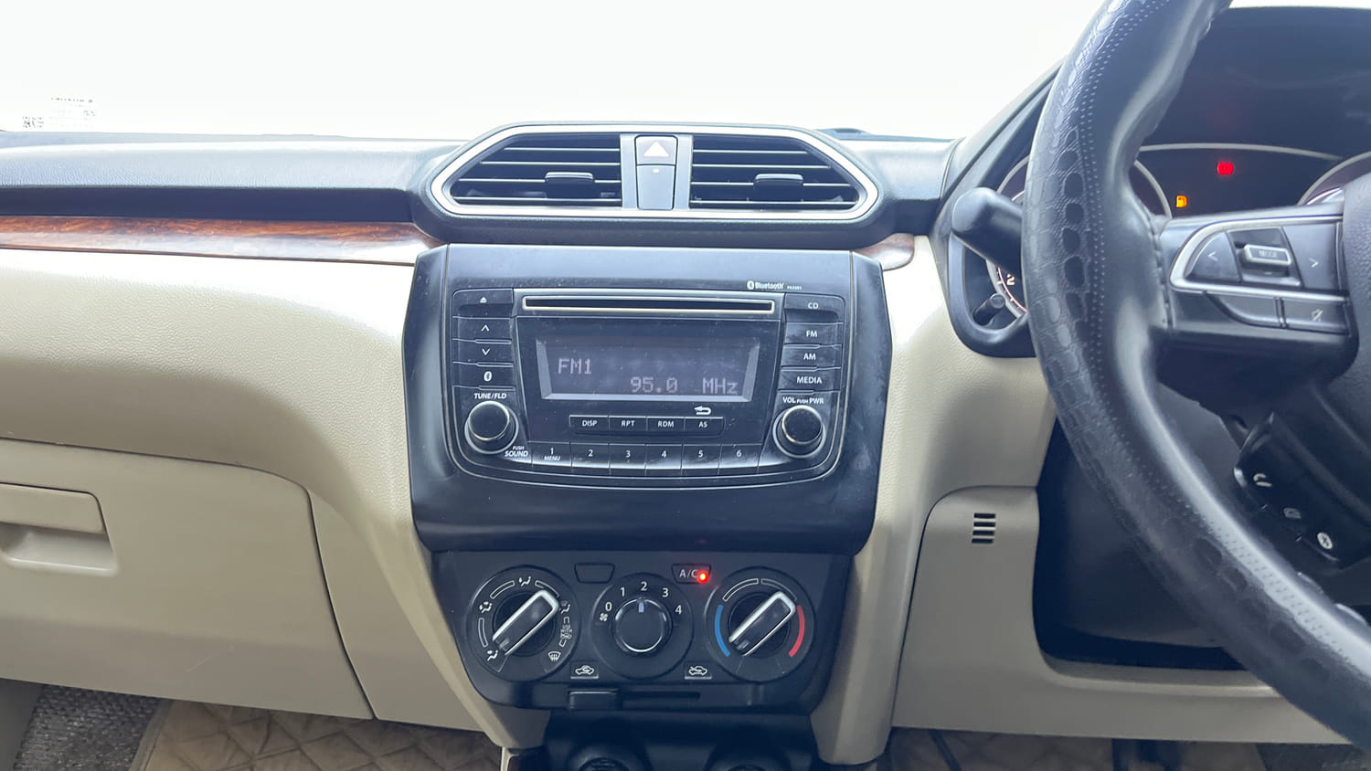 Used 2020 Maruti Suzuki Dzire VXi Petrol Manual interior MUSIC SYSTEM & AC CONTROL VIEW