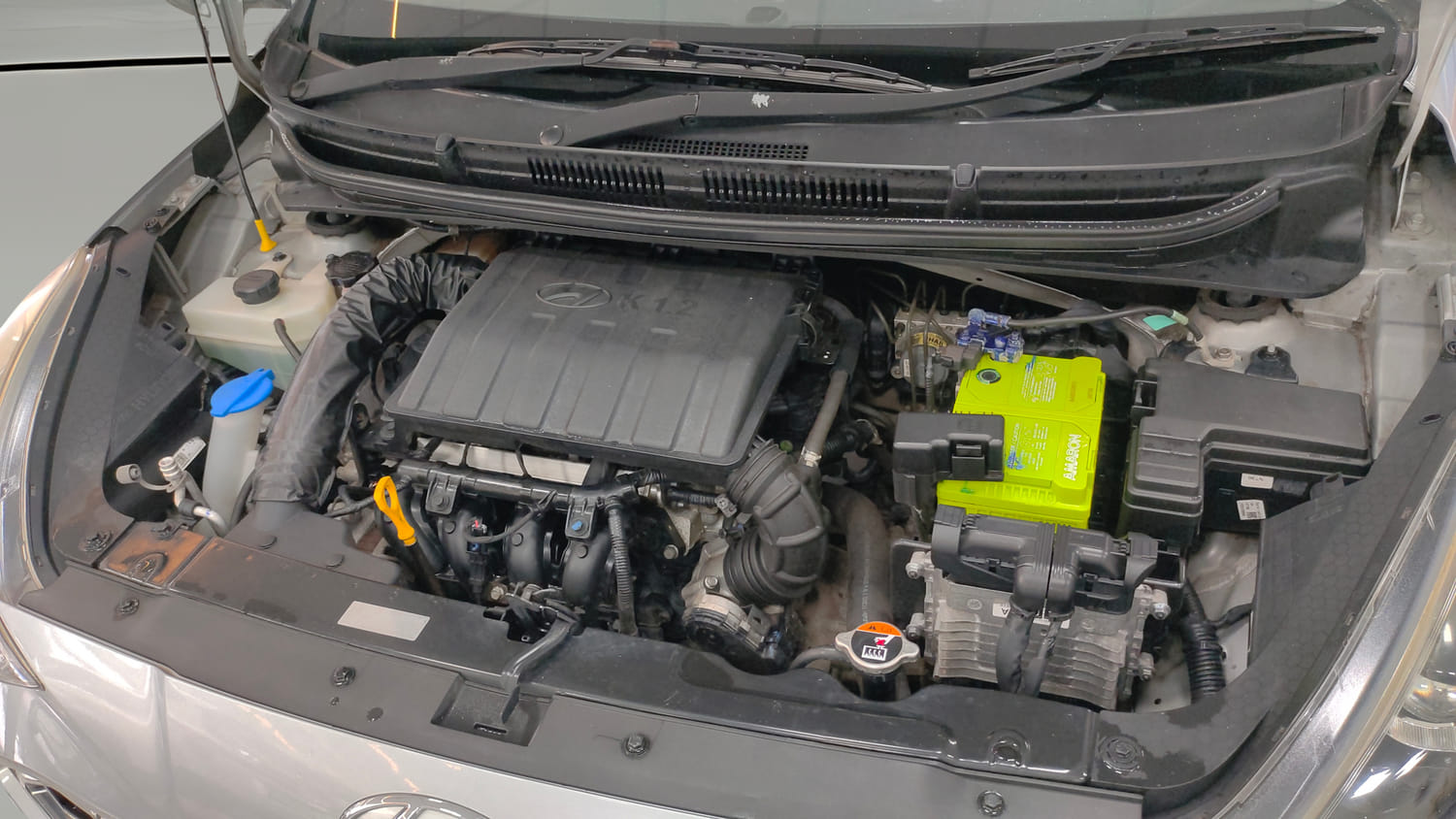 Used 2021 Hyundai Grand i10 Nios Sportz AMT 1.2 Kappa VTVT Petrol Automatic engine ENGINE LEFT SIDE VIEW