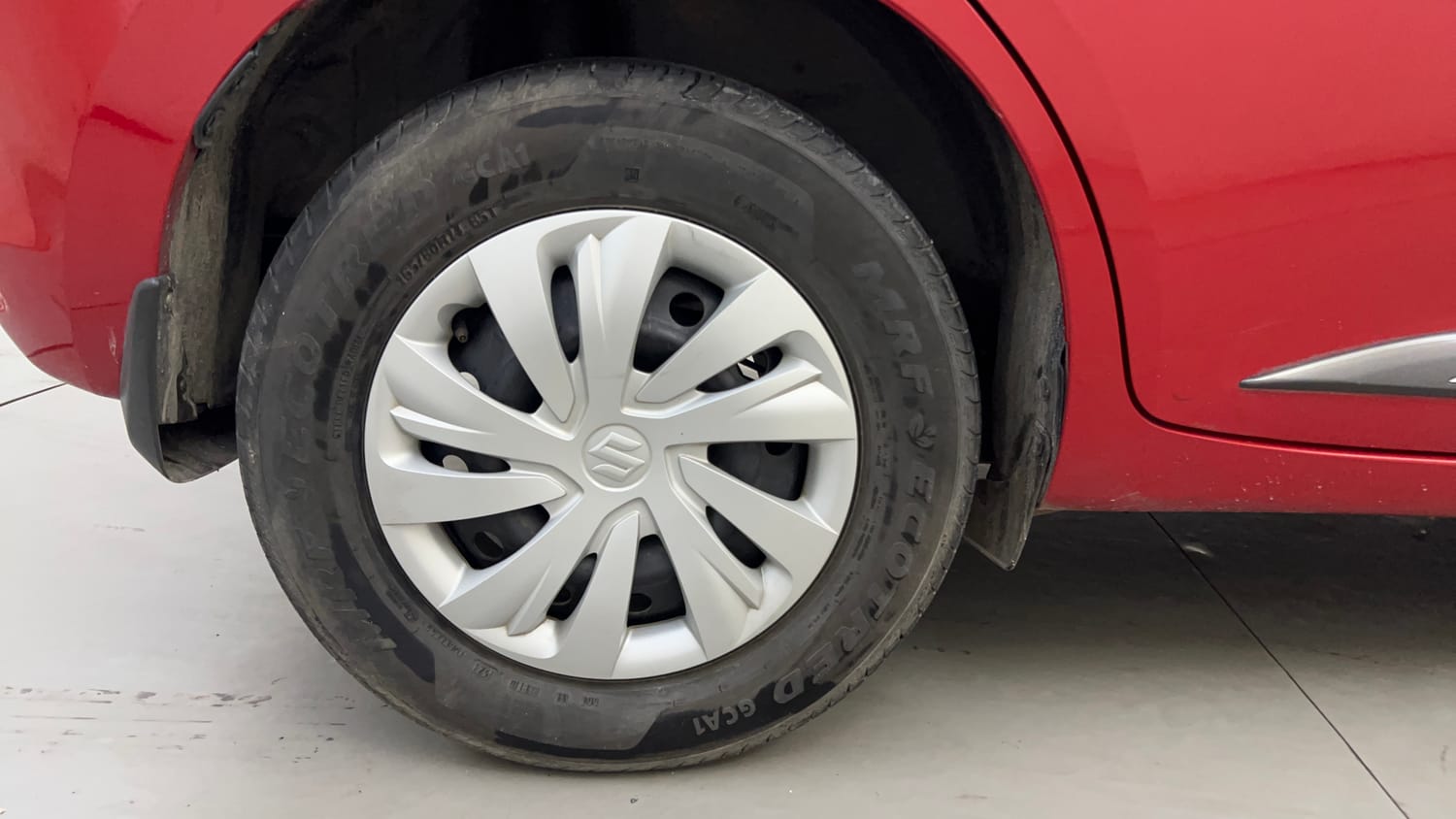 Used 2024 Maruti Suzuki Swift VXi Petrol Manual tyres RIGHT REAR TYRE RIM VIEW