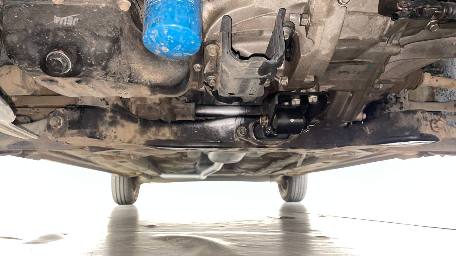 Used 2014 Hyundai Grand i10 Magna 1.2 Kappa VTVT Petrol Manual extra FRONT LEFT UNDERBODY VIEW