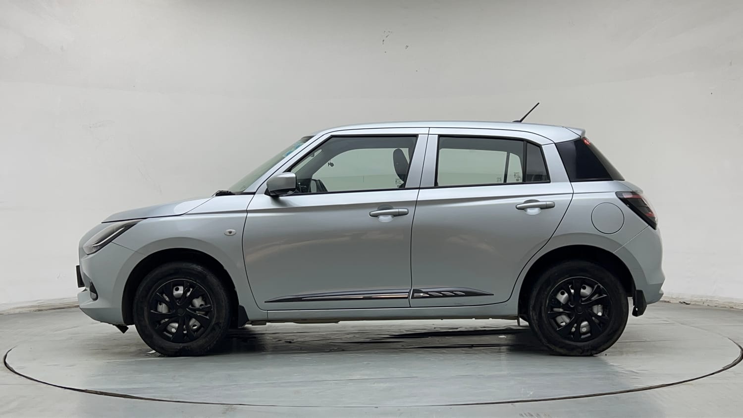 Used 2024 Maruti Suzuki Swift LXi Petrol Manual exterior LEFT SIDE VIEW