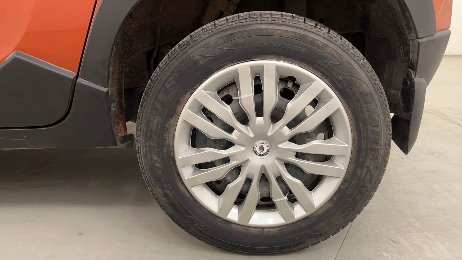 Used 2016 Mahindra KUV100 K6 6 STR Petrol Manual tyres LEFT REAR TYRE RIM VIEW