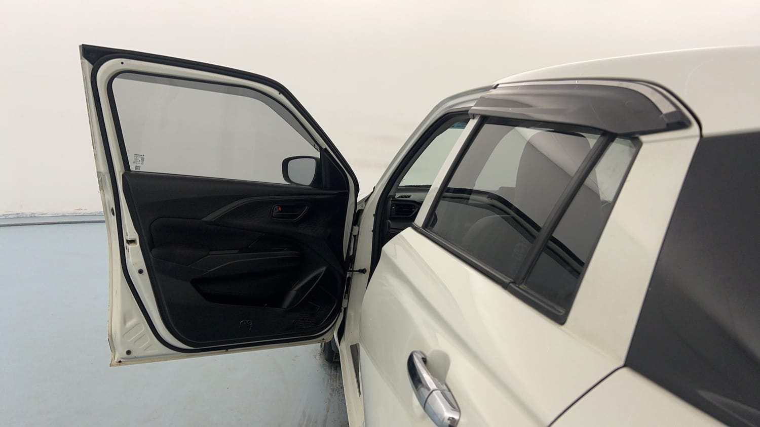 Used 2025 Maruti Suzuki Swift LXi Petrol Manual interior LEFT FRONT DOOR OPEN VIEW